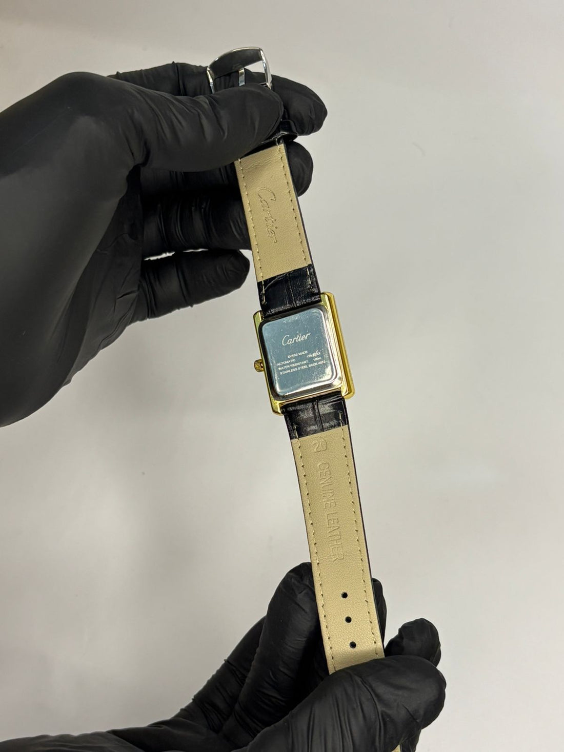 Cartier tank watch Golden finish  Black dial black strap